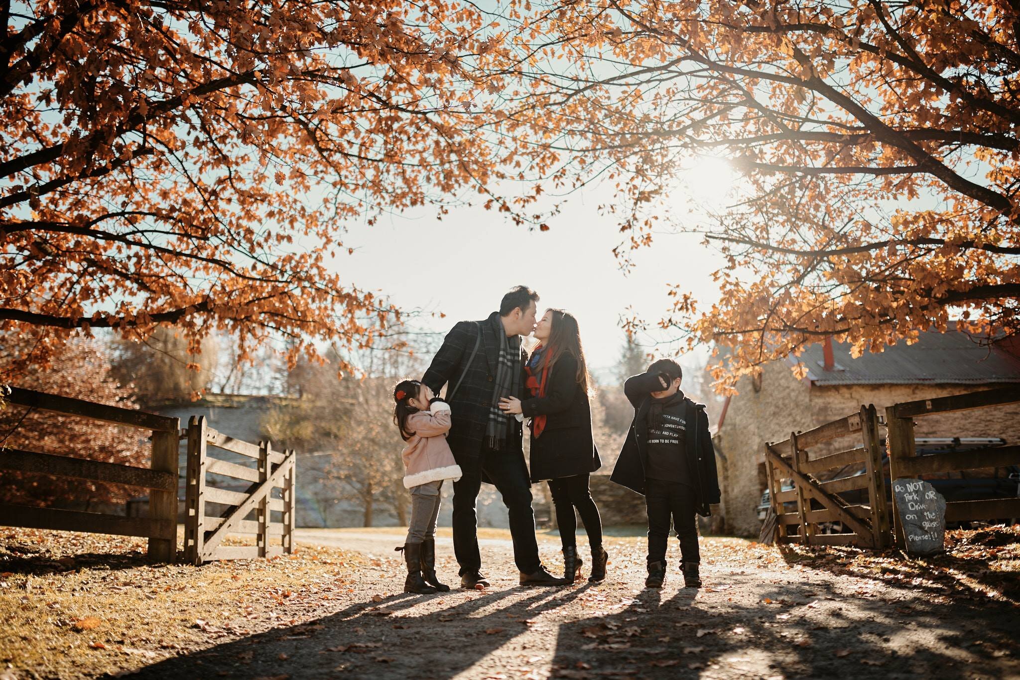 Family enjoying autumn walk Arrowtown